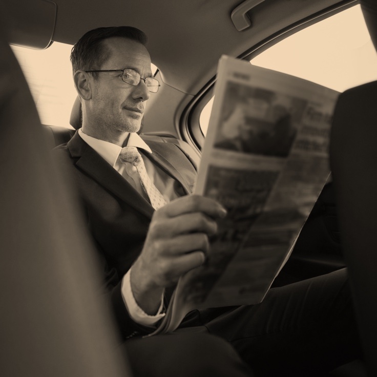 Control_guy_reading_paper_736_sepia.jpg